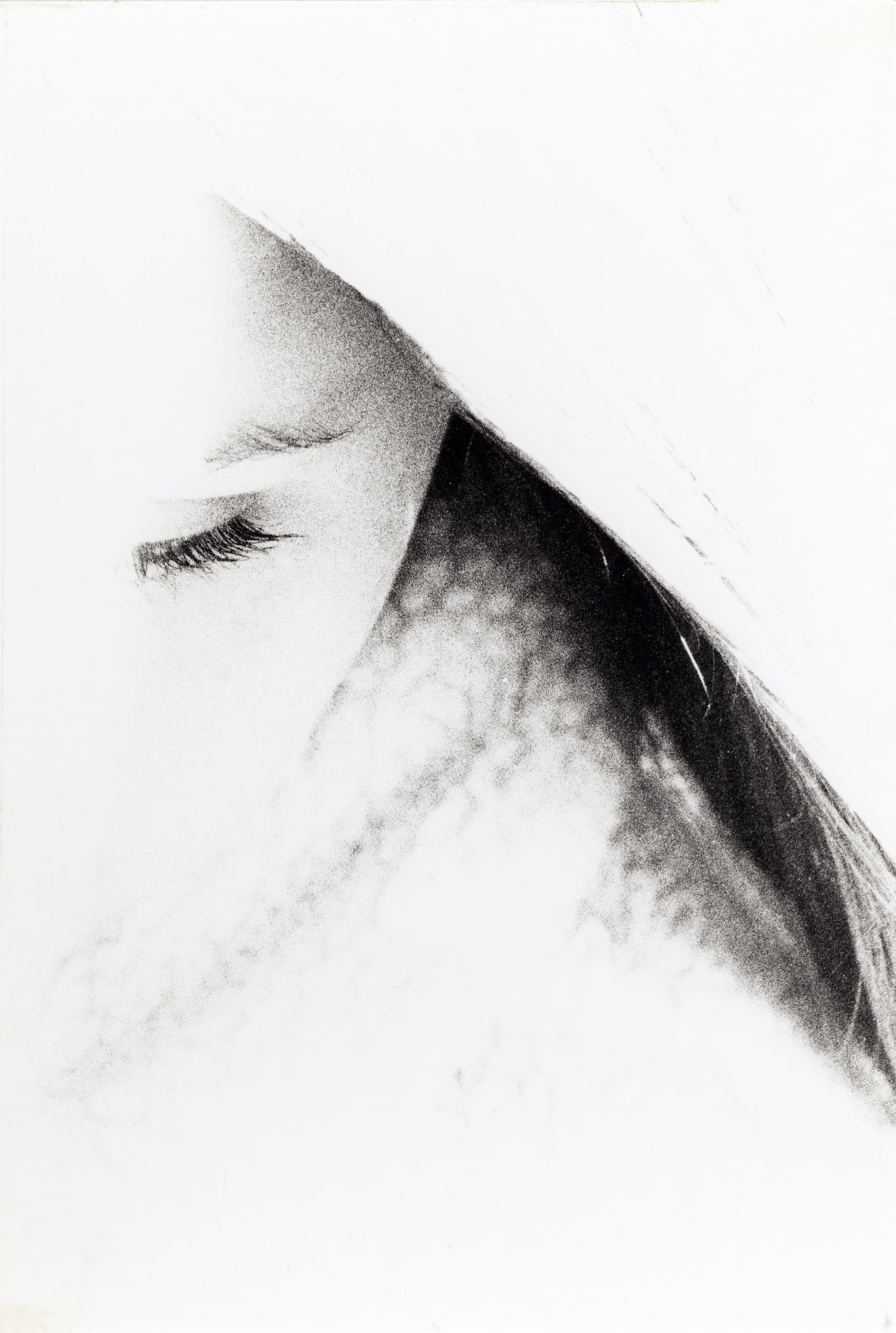 Black and white abstracted film photograph of a person